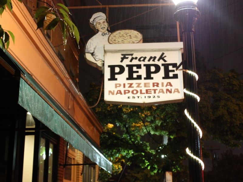 Try the famous classic coal-fired pizzas of Frank Pepe Pizzeria Napoletana